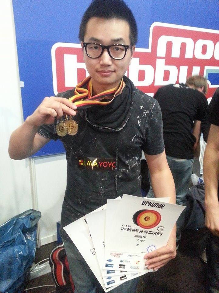 Professional yo-yo team members working together, modern office environment, product development focus